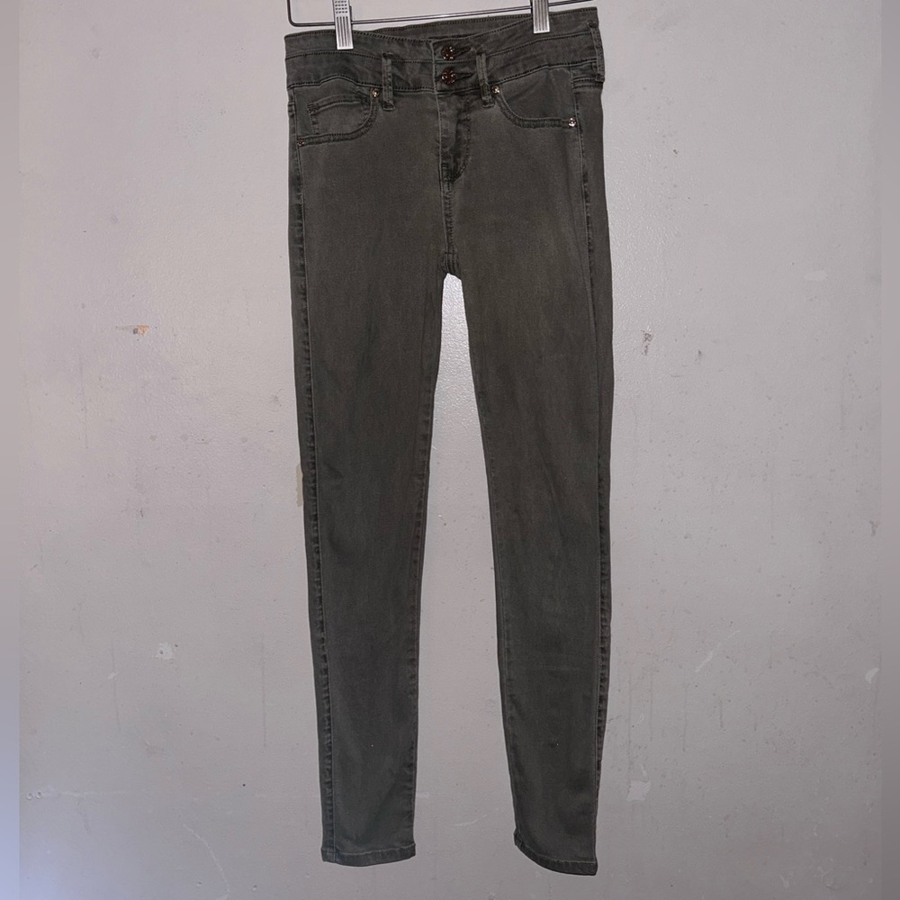 Guess skinny pants faded green with gold accents